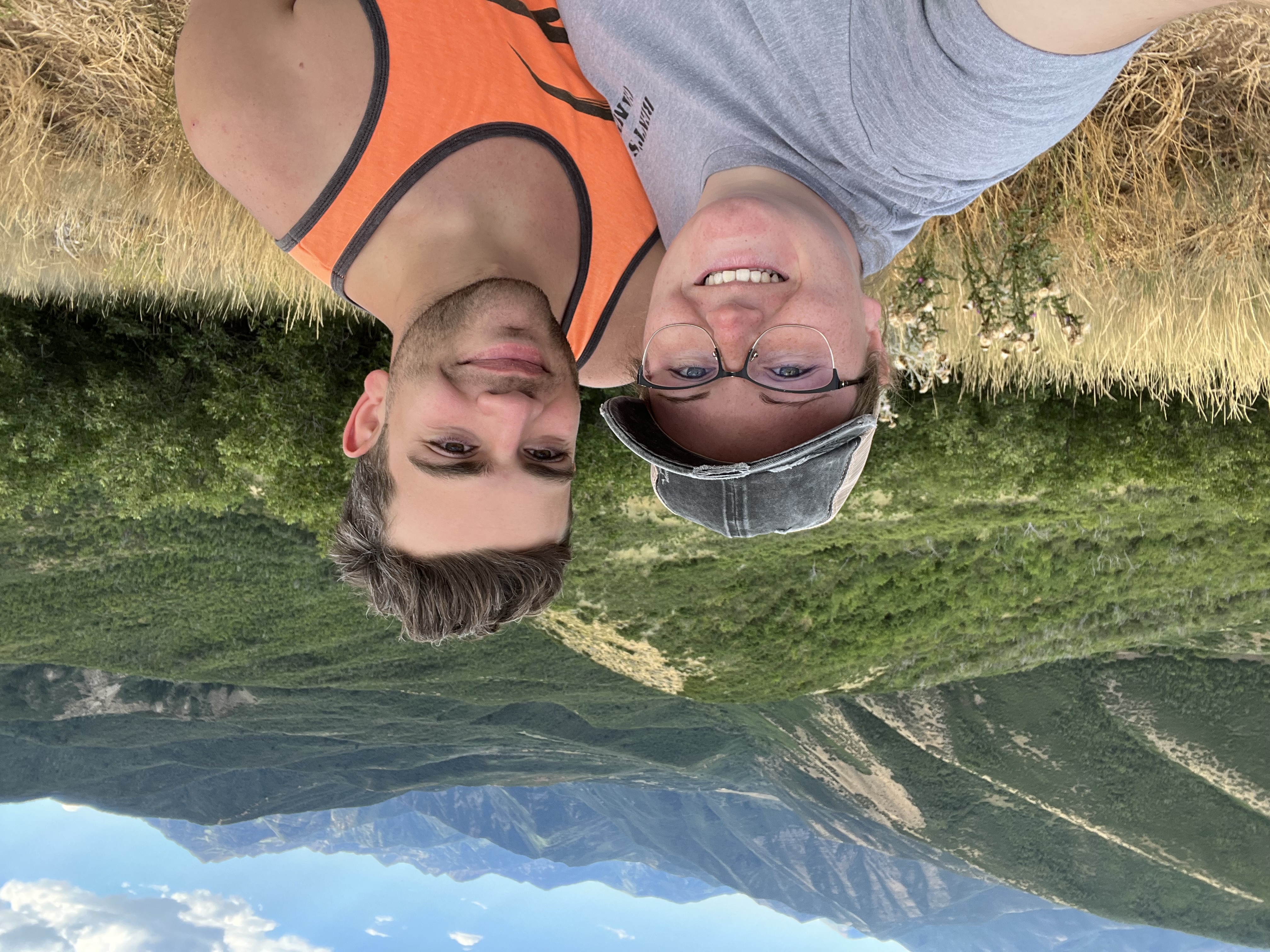 Ryan and Lynnsey with beautiful mountain landscape in background